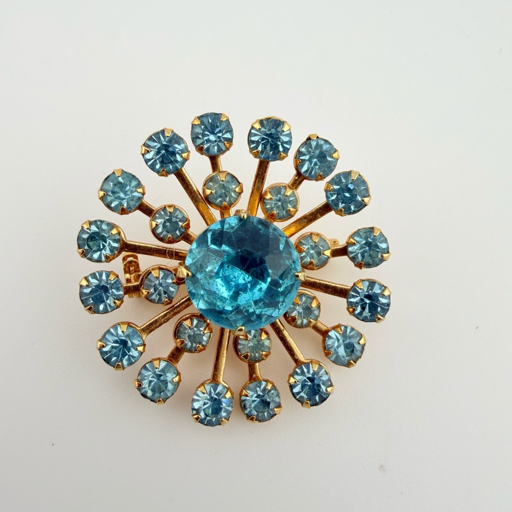 Vintage Gold Tone Snowflake Starburst Brooch Blue Rhinestone Sunburst Pin 1.75"